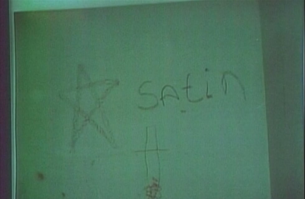 Photos of what Bryan Lamb wrote during the handwriting test were shown in court, piecing...