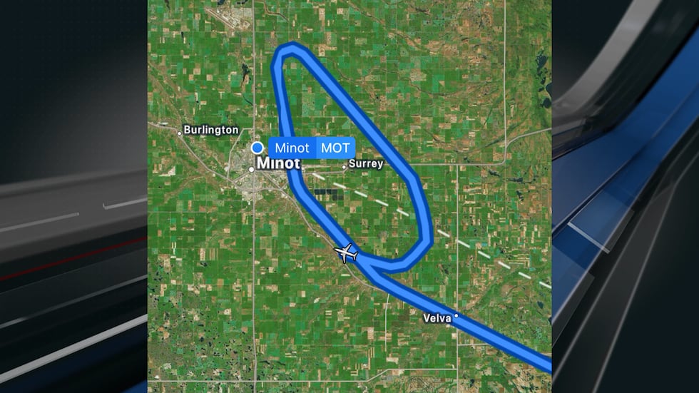A near-collision occurred close to Minot Saturday night involving a B-52 bomber and a Delta...