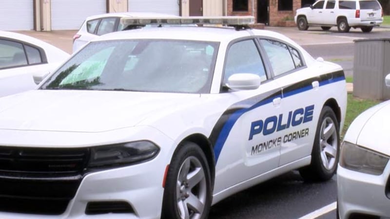 An officer in Moncks Corner was taken to the hospital after being hit by a driver while inside...