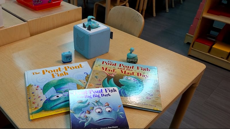 A Tonie Boxie in a classroom with the corresponding books.