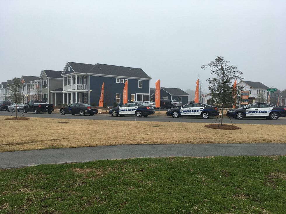Police cruisers line the Johns Island subdivision where 4-year-old Heidi Todd was reported...